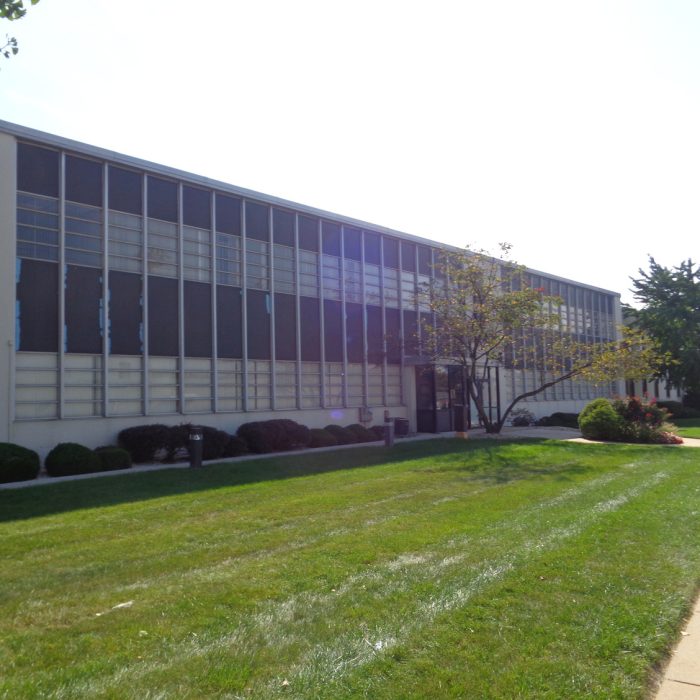 Before photo of the exterior of 1110 Princess Street office
