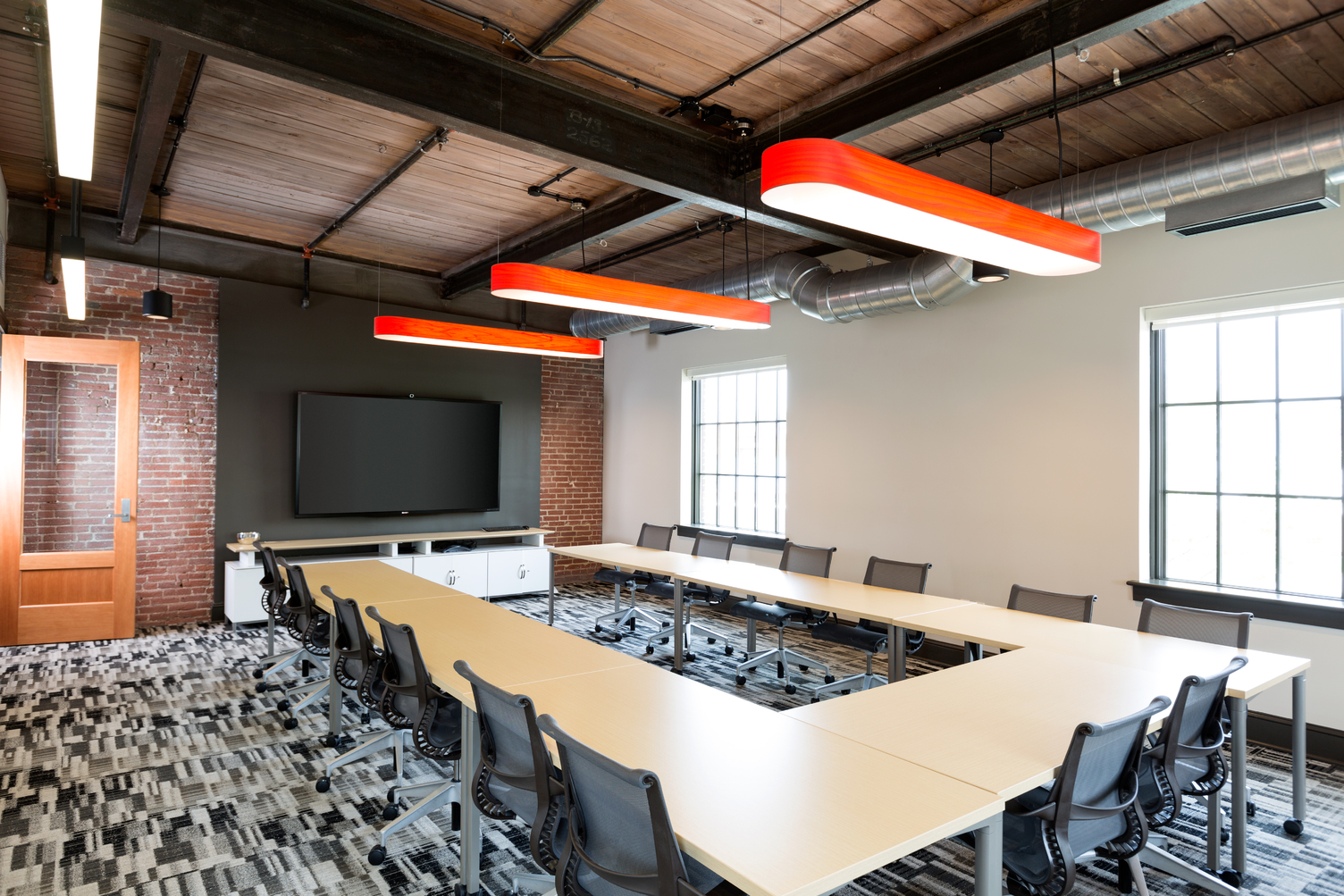 Collaborative work environment with work stations, team spaces and conference rooms with modern and classic styling