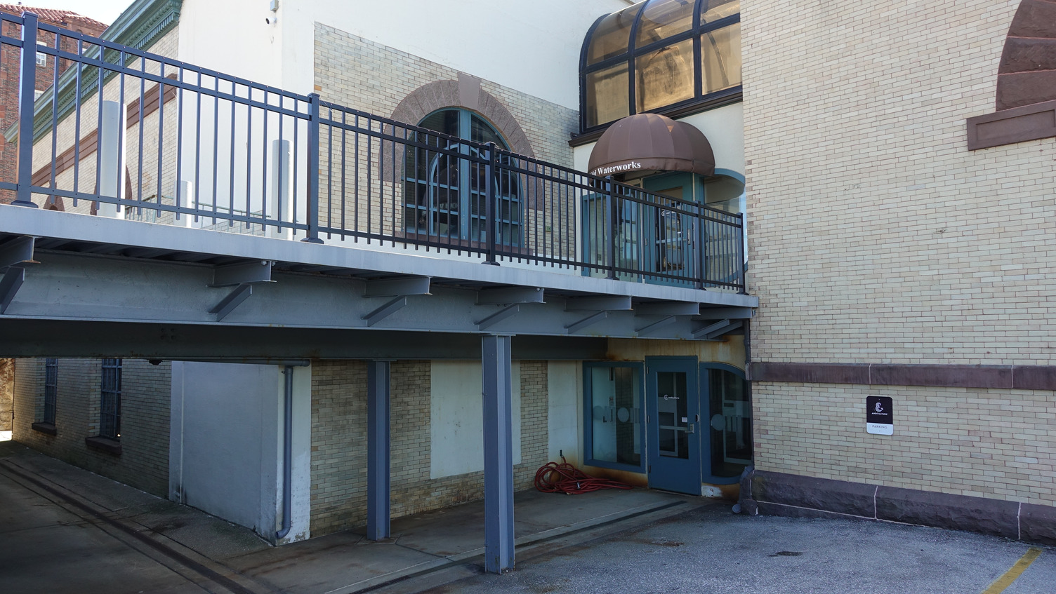 Historic building exterior with rooftop plaza