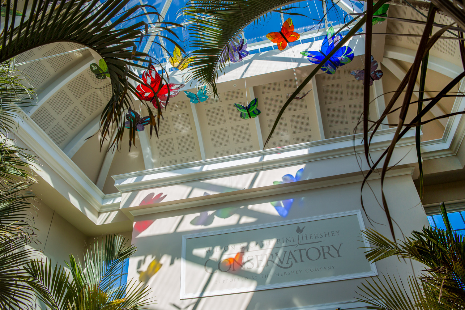 Visitor Center Welcome Pavilion with skylight and stained-glass butterflies