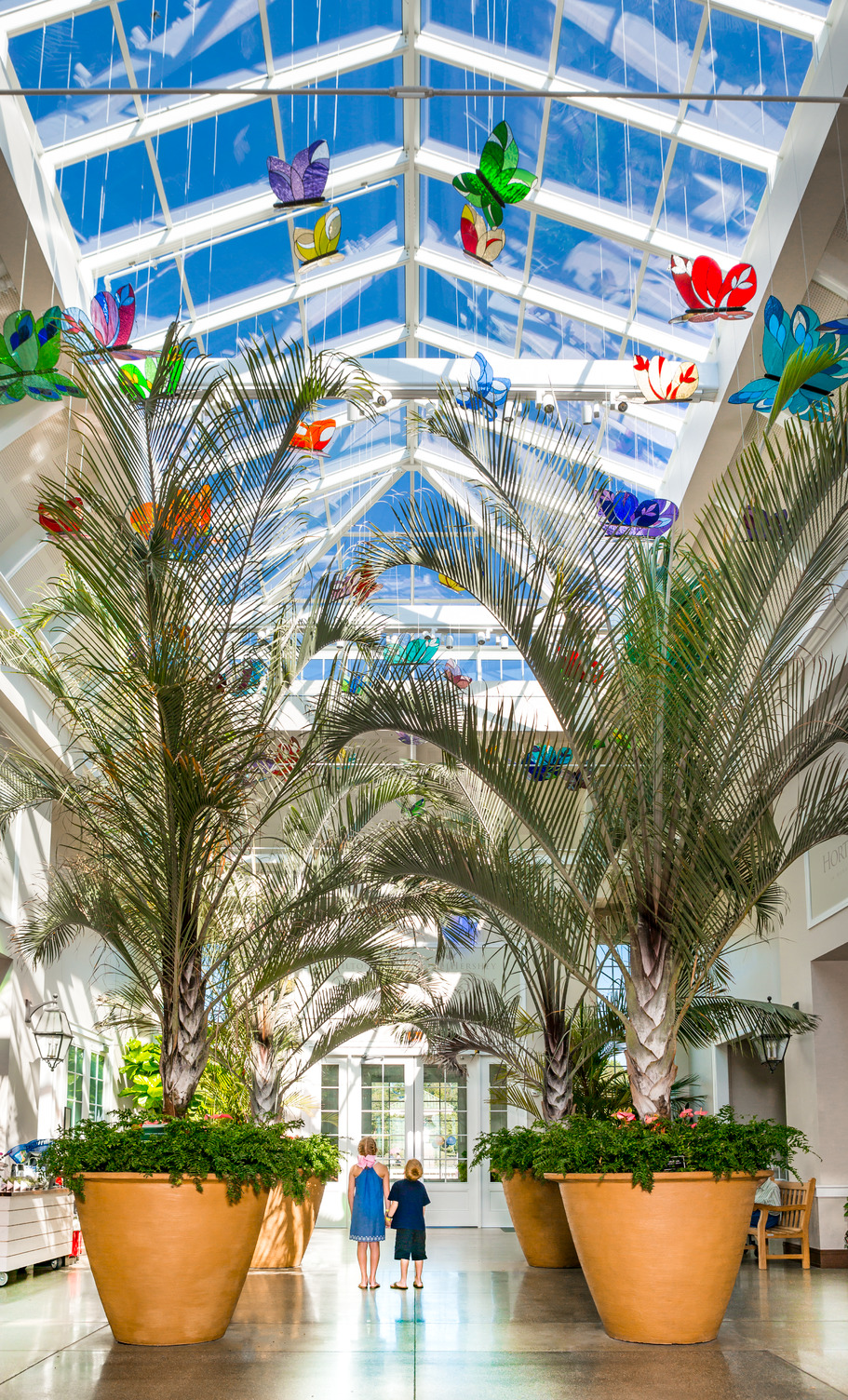 Visitor Center Welcome Pavilion with skylight and stained-glass butterflies