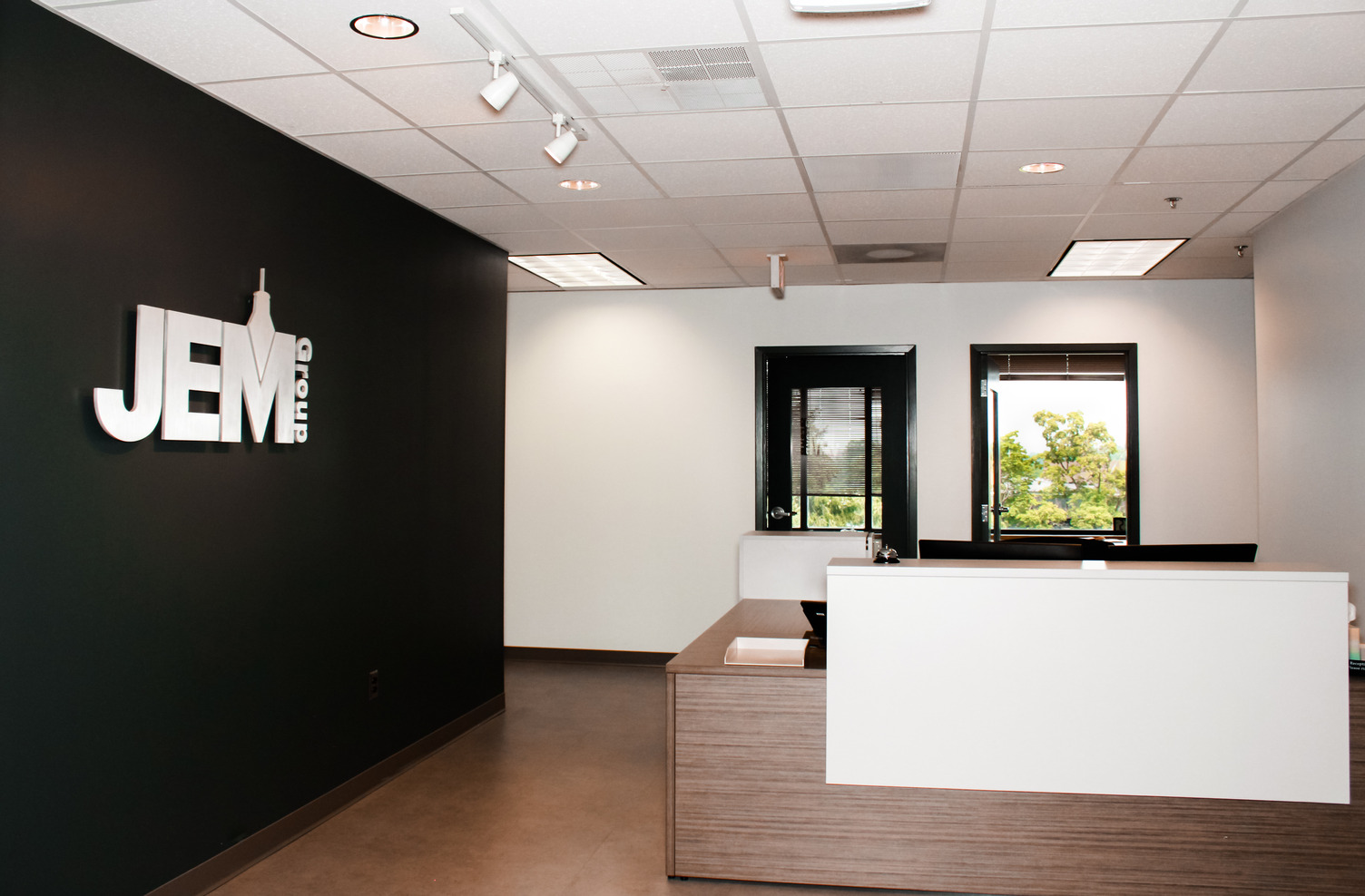 Branding accents in office space at JEM Group LLC office
