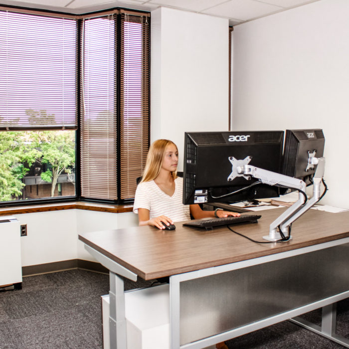Modern workstations and furniture elements at JEM Group LLC office