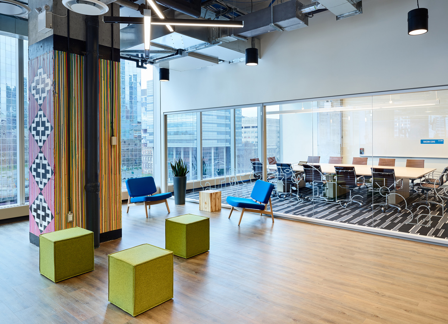 Vibrant workspaces with open, semi-private, and private booths for diversity in work styles